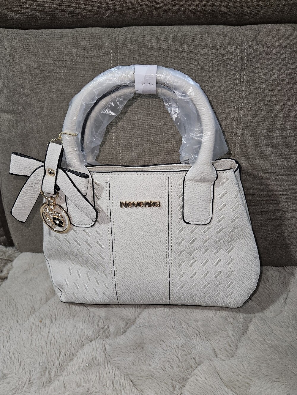 Cream Pebbled Leather Satchel with Bow Charm